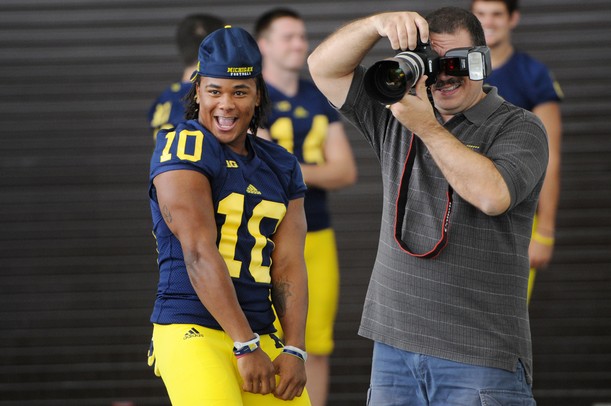Michigan junior wide receiver Jeremy Gallon goofs around as he attempts to distract junior quarterback Devin Gardner as he has his photo taken during media day at the Al Glick Field House on Sunday afternoon. Melanie Maxwell I AnnArbor.com